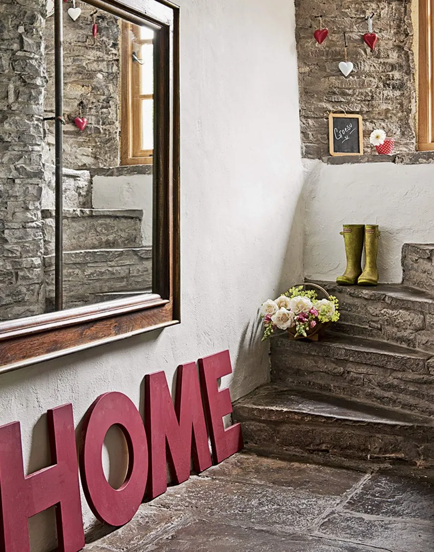 country-hallway-with-flagstone-floor-and-stone-steps