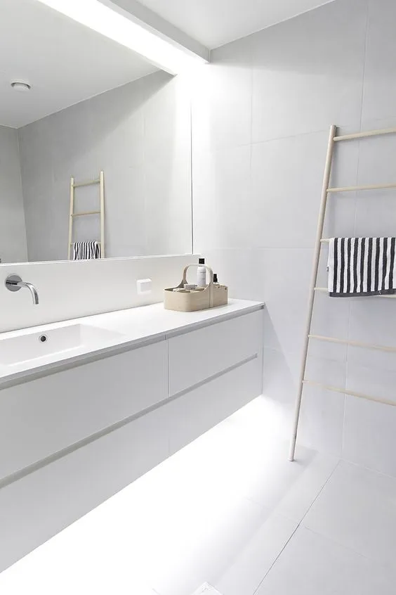 12-fill-your-white-bathroom-with-light-hiding-some-of-them-above