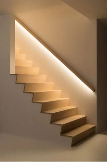 02-hidden-lights-in-the-banister-lights-up-the-staircase-so-the-owners-dont-need-any-lights-while-walking-up-or-down