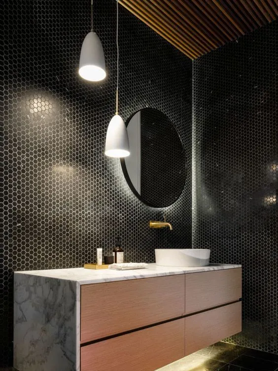 16-as-black-tiles-are-rather-dark-hidden-lights-make-the-bathroom-more-welcoming