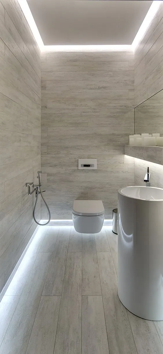 10-hidden-lighting-at-both-the-intersections-with-the-wall-is-a-great-idea-for-a-tiny-bathroom (1)