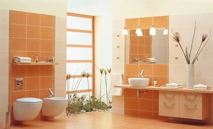 Оранжевый дизайн в ванной будет прекрасно выглядеть в тандеме с белым цветом
