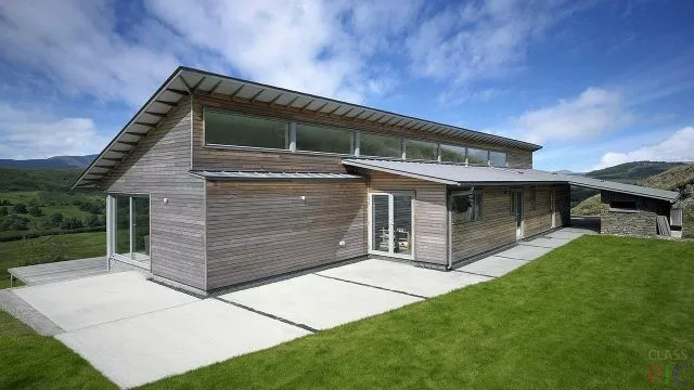 Каркасный дом с комбинированной односкатной крышей