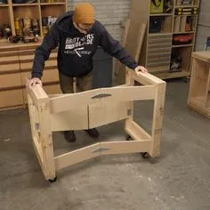 Build this handy mobile workbench that folds up to only 7 in. You only need two hours, some 2x4s, 3/4-in. plywood and 8’ of 1x4. Diy Wood Projects, Woodworking Shop, Woodworking Plans, Home Projects, Woodworking Videos, Woodworking Enthusiasts, Youtube Woodworking, Wooden Pallet Projects